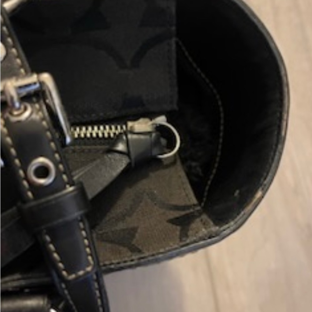 It’s a large signature C coach logo printed all over it